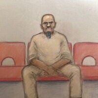 Essa Suleiman who is charged with attempted murder over a knife attack during which two Jewish men were stabbed in Golders Green, north London, appears via video link at the Old Bailey as his trial date has been set for next March, in London, Britain, May 15, 2026, in this courtroom sketch. (Julia Quenzler/Reuters)