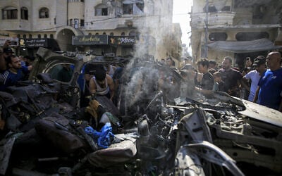 Palestinians gather to inspect the wreckage and damage at the site of an Israeli attack on a vehicle in the Tel al-Hawa neighborhood of Gaza City, on September 13, 2026 (Saeed M. M. T. Jaras / Anadolu via Reuters) Palestinians gather to inspect the wreckage and damage at the site of an Israeli attack on a vehicle in the Tel al-Hawa neighborhood of Gaza City, on September 13, 2026 (Saeed M. M. T. Jaras / Anadolu via Reuters)