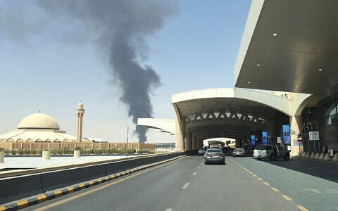 Large plume of black smoke rises from the fuel storage area at King Khalid International Airport, in Riyadh, Saudi Arabia, September 19, 2026. (Stringer/Reuters)