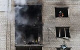 Firefighters work at the site of an apartment building which was hit by a Russian jet drone strike, amid Russia’s attack on Ukraine, in Kyiv, Ukraine September 25, 2026. (Thomas Peter/Reuters)