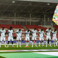 Ireland's soccer players bow their heads as the Israeli national anthem plays before their UEFA Nations League match in Debrecen, Hungary, September 27, 2026. (Bernadett Szabo/Reuters)