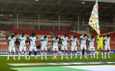 Ireland's soccer players bow their heads as the Israeli national anthem plays before their UEFA Nations League match in Debrecen, Hungary, September 27, 2026. (Bernadett Szabo/Reuters) Ireland's soccer players bow their heads as the Israeli national anthem plays before their UEFA Nations League match in Debrecen, Hungary, September 27, 2026. (Bernadett Szabo/Reuters)