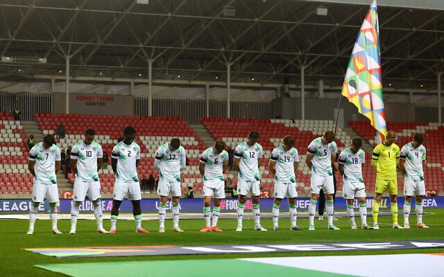 Ireland's soccer players bow their heads as the Israeli national anthem plays before their UEFA Nations League match in Debrecen, Hungary, September 27, 2026. (Bernadett Szabo/Reuters)