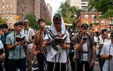 Students lead prayers outside New York City Mayor Zohran Mamdani's residence in Manhattan, September 18, 2026. (Luke Tress/Times of Israel)