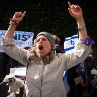 A protester in support of Prime Minister Benjamin Netanyahu, outside the United Nations in New York City, September 24, 2026. (Luke Tress/Times of Israel)