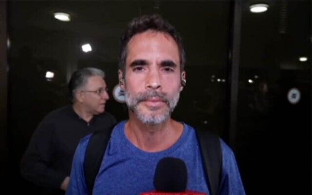 Assaf Rajuan, one of the Israelis who helped subdue a flydubai copilot who allegedly sought to hijack and crash a plane full of Israelis, on his return to Ben Gurion Airport on September 30, 2026. (Channel 12 screenshot) Assaf Rajuan, one of the Israelis who helped subdue a flydubai copilot who allegedly sought to hijack and crash a plane full of Israelis, on his return to Ben Gurion Airport on September 30, 2026. (Channel 12 screenshot)