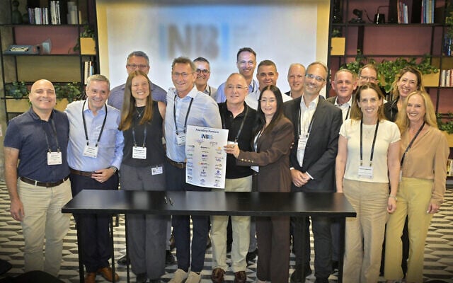 Dr. Anat Cohen-Dayag (front fourth from the right) and Sam Moed (front fourth from the left) launch Israel National Biotech Innovation Center (INBI) with representatives of the 15 top universities, medical centers and health organizations in Israel, Sept. 6, 2026. (Courtesy of Yossi Zwecker)