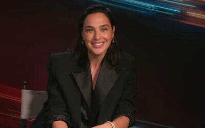 Gal Gadot shares more details about the DC Studios Wonder Woman franchise with 'Happy Sad Confused' podcast host Josh Horowitz in August 2026 (Screenshot/Josh Horowitz via YouTube)