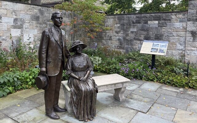 Statues of Henry and Clara Ford look over the garden at their historic Fair Lane home in Dearborn, Michigan, September 2, 2026. (Andrew Lapin/JTA)