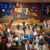 Ronen Itzhaki dance troupe performs at opening of 2026 Jerusalem Biennale art exhibit in front of Ardon Windows at the former National Library of Israel building on Givat Ram campus, with Arik Weiss staircase on the left, September 24, 2026 (Yacov Buta)