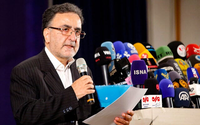 Iranian reformist politician Mostafa Tajzadeh speaks to the media after registering his candidacy for the presidency, at the Interior Ministry in the capital Tehran, on May 14, 2021. (AFP) Iranian reformist politician Mostafa Tajzadeh speaks to the media after registering his candidacy for the presidency, at the Interior Ministry in the capital Tehran, on May 14, 2021. (AFP)