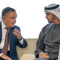 This handout image provided by the UAE Ministry Of Presidential Affairs shows (R to L) UAE Presiednt Sheikh Mohamed bin Zayed al-Nahyan meeting with Saleh Boucha, the special envoy of the president of Algeria, at the Sea Palace in the UAE capital Abu Dhabi on January 24, 2023. (Mohamed AL-HAMMADI/UAE’s Ministry of Presidential Affairs/AFP)