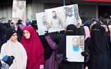 Women hold portraits of detained Islamists held in Roumieh prison during a protest calling for their release in the northern Lebanese port city of Tripoli on January 5, 2025. (Ibrahim Chalhoub/AFP)