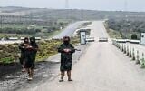 Illustrative: Syrian security personnel officers guard the road on the outskirts of Sweida, southern Syria on February 26, 2026. (LOUAI BESHARA/AFP)