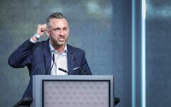 The far-right Alternative for Germany (AfD) party’s top candidate for regional elections Ulrich Siegmund gives a speech during the AfD’s regional congress in Magdeburg, eastern Germany, on April 11, 2026. (RONNY HARTMANN/AFP)