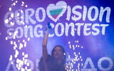 Bulgarian singer Dara, who won the 2026 Eurovision Song Contest with 'Bangaranga,' performs in front of the National Gallery of Art in Sofia, Bulgaria, on May 19, 2026, under the logo for the 2027 edition, which is set to take place in Burgas, Bulgaria. (Nikolay DOYCHINOV/AFP)