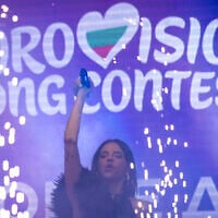 Bulgarian singer Dara, who won the 2026 Eurovision Song Contest with 'Bangaranga,' performs in front of the National Gallery of Art in Sofia, Bulgaria, on May 19, 2026, under the logo for the 2027 edition, which is set to take place in Burgas, Bulgaria. (Nikolay DOYCHINOV/AFP)