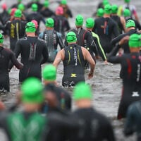 Illustrative: Triathletes enter the water to start the swim leg of the 2026 IRONMAN Canada-Ottawa on August 2, 2026 in Ottawa, Ontario, Canada. (Vaughn Ridley/Getty Images for Ironman/AFP)