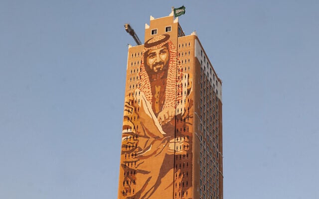 This picture shows a general view of the Tuwaiq Tower (also known as the Al-Muhaidib Tower or Tuwaiq Heritage Tower), with a mural of Saudi Arabia’s Crown Prince Mohammed bin Salman, by Saudi artist Bader Al-Balawi, seen on its facade, at the intersection of King Fahd Road and Anas bin Malik Road in Riyadh on August 20, 2026. (Fayez Nureldine/AFP)