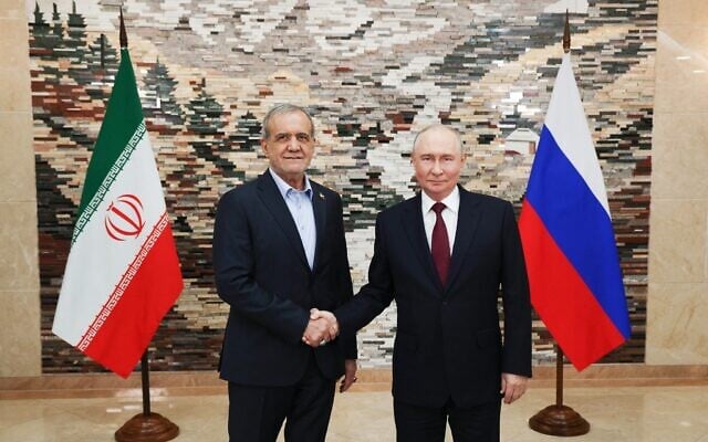 In this pool photograph distributed by the Russian state agency Sputnik, Russia’s President Vladimir Putin and Iran’s President Masoud Pezeshkian shake hands during a meeting on the sidelines of the Shanghai Cooperation Organisation (SCO) summit in Bishkek on September 1, 2026. (Vyacheslav PROKOFYEV/POOL/AFP) In this pool photograph distributed by the Russian state agency Sputnik, Russia’s President Vladimir Putin and Iran’s President Masoud Pezeshkian shake hands during a meeting on the sidelines of the Shanghai Cooperation Organisation (SCO) summit in Bishkek on September 1, 2026. (Vyacheslav PROKOFYEV/POOL/AFP)