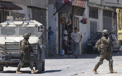 Israeli soldiers carry out a raid at the Askar camp, east of Nablus in the West Bank on September 4, 2026. (JAAFAR ASHTIYEH/AFP) Israeli soldiers carry out a raid at the Askar camp, east of Nablus in the West Bank on September 4, 2026. (JAAFAR ASHTIYEH/AFP)
