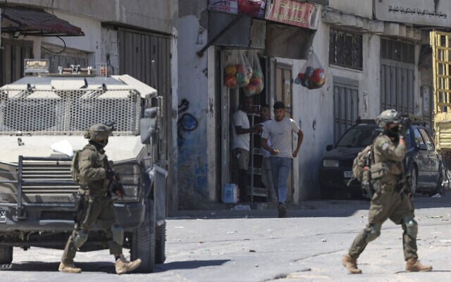 Israeli soldiers carry out a raid at the Askar camp, east of Nablus in the West Bank on September 4, 2026. (JAAFAR ASHTIYEH/AFP)
