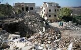 Residents inspect the damage after an overnight airstrike by the Israeli military that targeted Hezbollah in the southern Lebanese village of Mayfadoun on September 5, 2026. (ammar ammar/AFP)