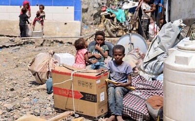 Children watch as internally displaced Yemenis who fled their homes due to renewed clashes between Yemen’s Saudi-backed government forces and the country’s Houthi rebels, unload their belongings and set-up makeshift homes in the al-Kadah area of the Taiz Governorate, southwestern Yemen on September 6, 2026. (Ahmad AL-BASHA/AFP) Children watch as internally displaced Yemenis who fled their homes due to renewed clashes between Yemen’s Saudi-backed government forces and the country’s Houthi rebels, unload their belongings and set-up makeshift homes in the al-Kadah area of the Taiz Governorate, southwestern Yemen on September 6, 2026. (Ahmad AL-BASHA/AFP)