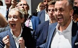 Ulrich Siegmund, the main candidate for the far-right Alternative for Germany at the Saxony-Anhalt state election, and AfD co-leader Alice Weidel celebrate after exit polls following Saxony-Anhalt’s state elections at the fairgrounds in Magdeburg, eastern Germany, on September 6, 2026. (Tobias Schwarz/AFP)