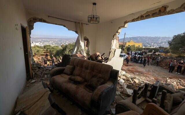 Palestinians inspect a family home destroyed by the IDF following a military operation after a wanted Palestinian man barricaded himself inside the house in the West Bank village of Aqraba, south of the city of Nablus on September 8, 2026. (JAAFAR ASHTIYEH/AFP)