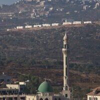 An image taken from the West Bank village of Aqraba shows a new illegal Israeli outpost being built above the village, south of the West Bank city of Nablus on September 8, 2026. (JAAFAR ASHTIYEH/AFP)