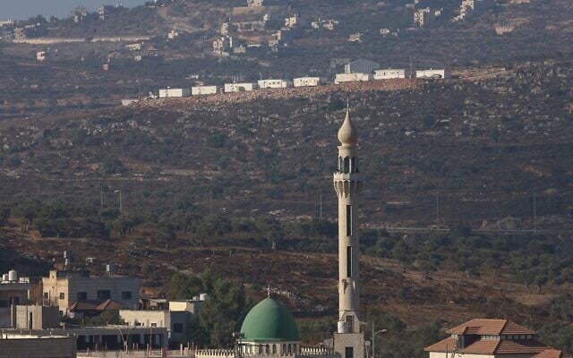 An image taken from the West Bank village of Aqraba shows a new illegal Israeli outpost being built above the village, south of the West Bank city of Nablus on September 8, 2026. (JAAFAR ASHTIYEH/AFP)
