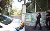 Police officers patrol in front of the entrance of the Musee Renoir after four paintings, valued at $10 million, were stolen from the museum in an early-morning break-in, with the two suspects still at large, in Cagnes-sur-Mer on September 8, 2026. (Valery HACHE/AFP)