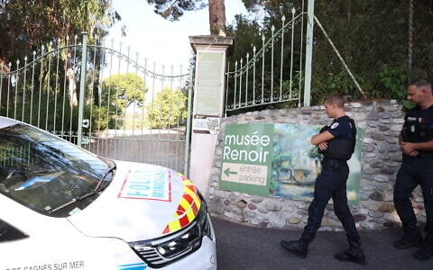 Police officers patrol in front of the entrance of the Musee Renoir after four paintings, valued at $10 million, were stolen from the museum in an early-morning break-in, with the two suspects still at large, in Cagnes-sur-Mer on September 8, 2026. (Valery HACHE/AFP)