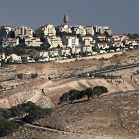 This photograph taken from the E1 corridor, an area in the West Bank shows vehicles driving along the highway near the Israeli settlement of Maale Adumim, on September 8, 2026. (Ahmad GHARABLI/AFP)