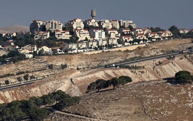 This photograph taken from the E1 corridor, an area in the West Bank shows vehicles driving along the highway near the Israeli settlement of Maale Adumim, on September 8, 2026. (Ahmad GHARABLI/AFP)