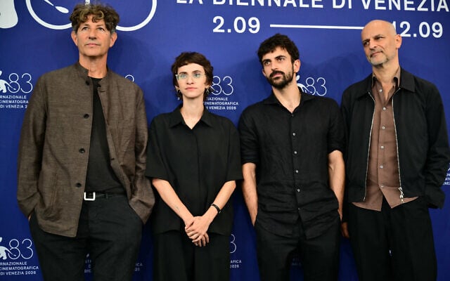 (From L) British director Jonathan Glazer, Israeli journalist and director Rachel Szor, Israeli journalist and filmmaker Yuval Abraham and British producer James Wilson attend the photocall of 'NAZA' at the 83rd International Venice Film Festival, at Venice Lido, Italy, on September 10, 2026. (Stefano RELLANDINI/AFP)