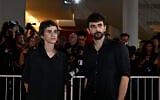 Filmmakers Rachel Szor, left, and Yuval Abraham attend a red carpet event for the screening of 'NAZA' at the 83rd International Venice Film Festival, in Venice Lido, Italy, on September 10, 2026. (Tiziana FABI/AFP)