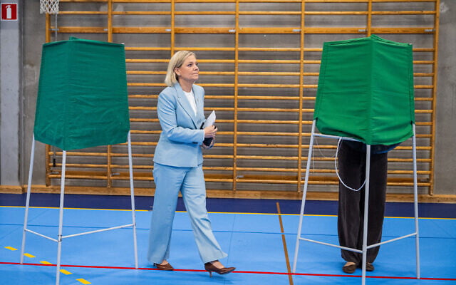 Social Democratic Party leader Magdalena Andersson walks on her way to cast her vote at a polling station in a school during Sweden’s general election, in Nacka on September 13, 2026. (Jonathan NACKSTRAND/AFP)