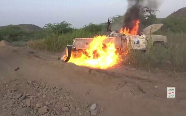 This screen grab taken from undated video footage released on September 12, 2026 by Ansarullah Media Centre purportedly shows a truck belonging to Saudi-backed forces burning after Houthi fighters set it on fire. (ANSARULLAH MEDIA CENTRE/AFP)