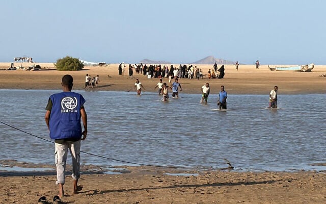 This handout picture taken and released by the International Organization for Migration (IOM) Djibouti shows refugees from Yemen fleeing fighting between government forces and Iran-backed Houthi authorities as they arrive at a Djibouti Coast Guard post in Khor Angar on September 13, 2026. (Handout/IOM Djibouti/AFP)