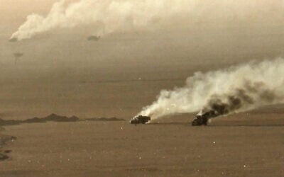 This handout picture released on September 15, 2026, by the Houthi Ansarullah Media Center reportedly shows burning military vehicles that they targeted in Saudi Arabia's al-Jawf. (ANSARULLAH MEDIA CENTER/AFP)