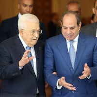 Egypt’s President Abdel Fattah al-Sisi (R) receives Palestinian Authority President Mahmoud Abbas during a meeting in Cairo, September 16, 2026. (Thaer GHANAIM/PPO/AFP)