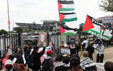 Pro-Palestinian protesters demonstrate near Lincoln Financial Field ahead of Ed Sheeran’s concert in Philadelphia, Pennsylvania, on September 19, 2026, following the removal of rapper Macklemore from Sheeran’s US tour. (Matthew Hatcher/AFP)