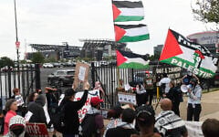 Pro-Palestinian protesters demonstrate near Lincoln Financial Field ahead of Ed Sheeran’s concert in Philadelphia, Pennsylvania, on September 19, 2026, following the removal of rapper Macklemore from Sheeran’s US tour. (Matthew Hatcher/AFP)
