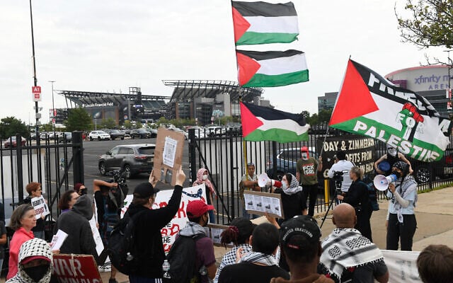 Pro-Palestinian protesters demonstrate near Lincoln Financial Field ahead of Ed Sheeran’s concert in Philadelphia, Pennsylvania, on September 19, 2026, following the removal of rapper Macklemore from Sheeran’s US tour. (Matthew Hatcher/AFP)