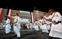 Band members of the Houthi authorities perform during a ceremony to mark the 12th anniversary of takeover of Yemeni capital, in Sanaa on September 20, 2026. (Mohammed HUWAIS/AFP)