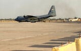 A US Air Force C-130 Hercules military transport aircraft prepares for takeoff from Camp Victory on the outskirts of Baghdad International Airport on September 29, 2026. (Ammar Karim/AFP)