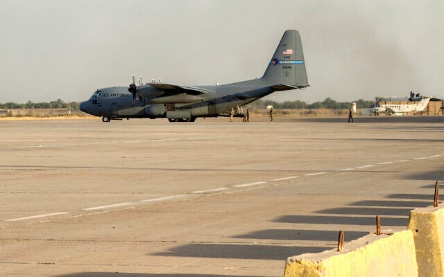 A US Air Force C-130 Hercules military transport aircraft prepares for takeoff from Camp Victory on the outskirts of Baghdad International Airport on September 29, 2026. (Ammar Karim/AFP)