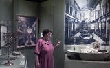 Illustrative: Riki Greenspan who conducts tours at the University of South Carolina McKissick Museum in Columbia, S.C., is shown in front of the exhibit featuring 300 years of southern Jewish life in the state April 30, 2002. (AP Photo/Lou Krasky)